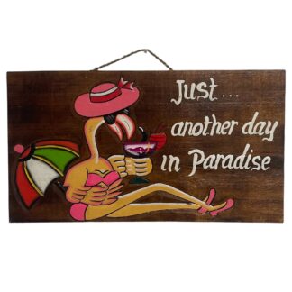 'Just Another Day in Paradise' sign with flamingo