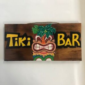 'Tiki bar' sign with man with palm trees in head