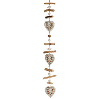 Hanging hearts and driftwood