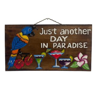 ' just another day in paradise' sign with parrot, drinks and flowers