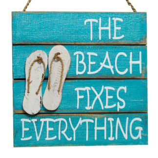 'The beach fixes everything' sign