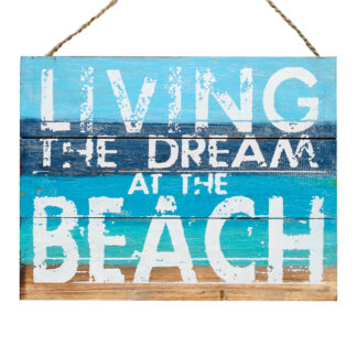 'Living the dream at the beach' sign