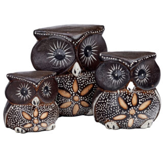 Family of three cartoon owls with etched pattern