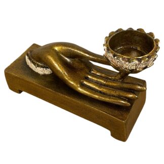 Resin hand on plinth tea light holder