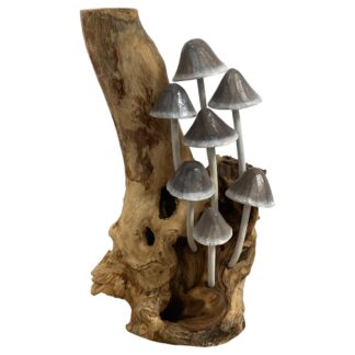 Grey painted mushrooms on root