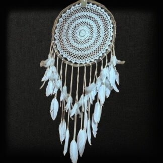Macrame dreamcatcher with rattan frame and feather tassels