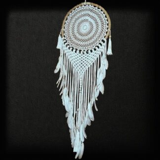 Macrame dreamcatcher with rattan frame and feather tassels