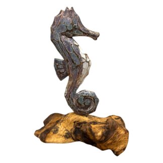 Painted seahorse on driftwood