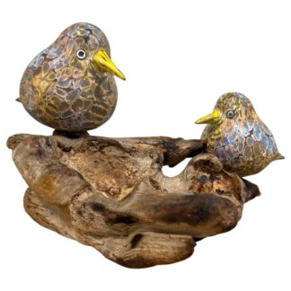 Abstract mother and chick on driftwood